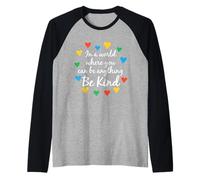 En un Mundo Donde Puedes ser Cualquier Cosa, sé Amable Autismo Camiseta Manga Raglan