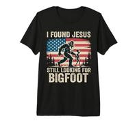 Encontré a Jesús todavía Buscando Bigfoot Retro American Flag Camiseta Premium