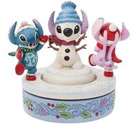 Enesco Figura decorativa Disney Stitch y Ángel con muñeco de nieve rotativo