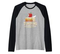 Enseñando a un Maestro de Escuela en casa de bandada Muy ruidosa y hambrienta Camiseta Manga Raglan