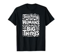 Enseñar a los Humanos pequeños a Hacer Grandes Cosas Camiseta
