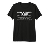 Enseñar es fácil como Andar en Bicicleta en Llamas Profesor Divertido Camiseta Premium