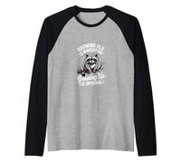 Envejecer es Inevitable Crecer es una opción Camiseta Manga Raglan