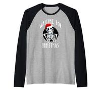 Esperando Navidad Esqueleto Divertido Sombrero de Santa Navidad Meme Camiseta Manga Raglan