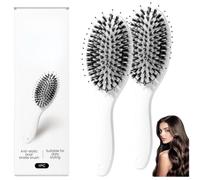 Este cepillo de cojín, éxito mundial en ventas, se ha agotado cinco veces. Cuenta con un cepillo retráctil de cerdas de jabalí y cabezales de masaje con microbolas, ideal para cabello fino y suave.