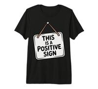 Este es un Signo Positivo: Cita Divertida, Motivacional y optimista Camiseta Premium