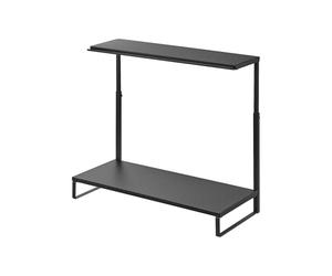 Este Soporte eleva el Monitor a una Altura cómoda y Ofrece Espacio de Almacenamiento en Dos Niveles. La repisa Superior Dispone de una Ranura