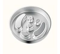 Este tazón de alimentación lenta, diseñado específicamente para los pekineses, está hecho de acero inoxidable y cuenta con un diseño de doble cara. B