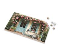 Eurographics Puzzles - Rompecabezas de 1000 piezas, una bicicleta estacionada frente a una encantadora casa adornada con flores rosas. Rompecabezas de imágenes para adultos, regalos de Pascua para