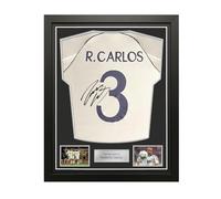 Exclusive Memorabilia Camiseta del Real Madrid 1999-00 firmada por Roberto Carlos. Enmarcada.