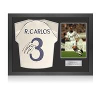 Exclusive Memorabilia Camiseta del Real Madrid 1999-00 firmada por Roberto Carlos. Marco icónico.