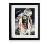 Exclusive Memorabilia Foto del Real Madrid firmada por Luka Modric: Ganador de la U nmarcada.