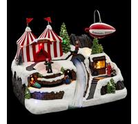 FEERIC LIGHTS & CHRISTMAS Pueblo de Navidad dirigible Animado/Musical 12 LED + Transformador