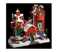 FEERIC LIGHTS & CHRISTMAS Pueblo de Navidad fábrica de Regalos Animado/Musical 22 LED + Transformador