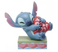 Figura Enesco Disney Stitch Abrazando un Corazón - 13 cm