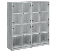 Fisinber Librería con puertas de cristal gris Sonoma 136 x 37 x 142 cm | Estantería de pie estable con 16 compartimentos y puertas de cristal para salón y oficina, elegante madera gris Sonoma.