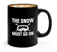 Flairy Land Taza de café de 325 ml, color negro, con texto en inglés "The snow must go on", gafas de esquí, snowboard, esquí, snowboard, regalo, esquiadores, senderismo, montaña, snowboareing