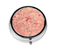 Flores de corazón rojo. Este pequeño pastillero redondo es un organizador portátil de medicamentos de viaje con tres compartimentos para almacenar medicamentos diarios.