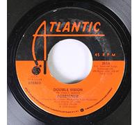 Foreigner - Randy Travis 45 RPM I Told You So / Good Intentions