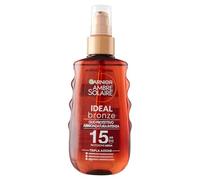 Garnier Aceite de bronceado en aerosol, protección media, SPF 15+, bronceado dorado e intenso, piel protegida y besada por el sol, resistente al agua, Ambre Solaire, Bronce ideal, 150 ml