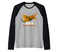 Gato Agente Secreto en Misión - Arte divertido de la parodia de espías Camiseta Manga Raglan