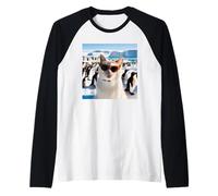 Gato divertido en el polo sur explorando con pingüinos Camiseta Manga Raglan
