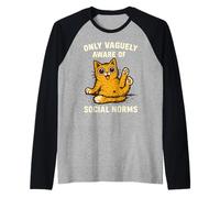 Gato divertido solo vagamente consciente del diseño de normas sociales Camiseta Manga Raglan