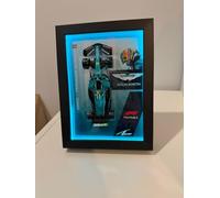 Genérico Cuadros 3D de Fórmula 1 con Iluminación LED, Marcos Decorativos de Carreras con Luz de Colores, Display de Autos F1 con Efecto 3D (AMR25 LED, 15x20 CM)