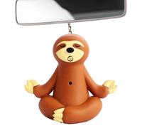 Genérico Cute Design: The Keychain is a sitting in a meditative po