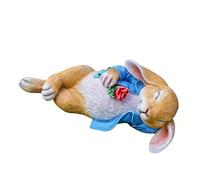 Genérico Figuras De Conejo,Figurilla de Conejo Acostado Bonito Sosteniendo una Flor,Estatua Animal Exterior 30 Cm - para Pascua Hogar Estreno Centro de Mesa Jardín Césped Patio Interior