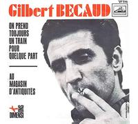 Gilbert Bécaud - On prend toujours un train pour quelque part / Au magasin d'antiquités [45T/7"]