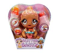 Glitter Babyz Muñeca Solana Sunburst - Con 3 cambios de color mágicos, pelo rosa coral y vestido tropical - Incluye pañal, biberón y chupete reutilizables - Para coleccionar - Edad: 3+ años