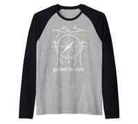 Guided by Care Brújula Diseño de autocuidado Camiseta Manga Raglan