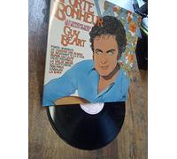 Guy Beart - WEA 00031 - Guy Beart : "Chansons gaies des belles années" - Porte-bonheur, Je connais une blonde, En revenant de la revue, Quand les lilas, Viens poupoule, La valse brune, La mattchiche, Mon Paris, Caroline, La Baya. (1 disque vinyle 33t LP in pochette ouvrante)