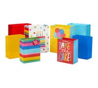 Hallmark Bolsas de regalo de cumpleaños surtidas (8 bolsas: 4 medianas de 9 pulgadas, 4 grandes de 13 pulgadas) para tartas de cumpleaños, rayas, globos, sólidos en rojo, amarillo, azul