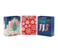 Hallmark Bolsas grandes de regalo de Navidad de 13 pulgadas (3 bolsas: medias rosas en rama, copos de nieve de papel, patinaje sobre hielo en la ciudad) para niños, adolescentes, amigos, profesores