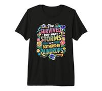 He Sobrevivido a demasiadas tormentas para ser molestado por Gotas de Lluvia Camiseta Premium