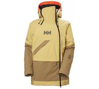 Helly Hansen Powchaser Asymmetric, chaqueta de esquí, mujer, marrón claro/amarillo 40(L) Sand