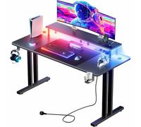 HLFURNIEU Mesa Gaming LED 120 x 60 cm, Escritorio Gaming con Toma de Corriente y Soporte para Monitor, Mesa Gamer con Portavasos y Gancho para Auriculares, Superficie de Fibra de Carbono, Negro