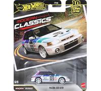 Hot Wheels Mazda 323 GTR, Coche de Juguete Premium a Escala 1:64, con neumáticos Real Riders y Carrocería y Chasis Metal/Metal, JKF17