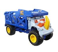 Hot Wheels Monster Trucks Rhino Rig Camión Juguete Portaautos, Grande | Camión grande transporta y guarda 12 Monster Trucks 1:64 o 32 coches, claxon amarillo sobre el capó, HFB13