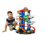 Hot Wheels Ultimate Garage Playset y 2 Coches | Set de pistas con Robo T-Rex, varios niveles para carreras, acrobacias y guardar 100+ coches 1:64