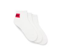 HUGO Paquete de tres pares de calcetines tobilleros con etiquetas con logo rojas - Style3P SH RIB LABEL CC, 50541597 Blanco 43-46