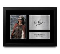 HWC Trading FR A4 Orlando Bloom Pirates of the Caribbean Los Regalos Imprimieron La Imagen Firmada Del Autógrafo Para Los Fans De La Memorabilia De La Película - A4 Framed