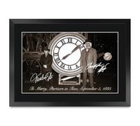 HWC Trading Michael J Fox & Christopher Lloyd Back to the Future Los Regalos Imprimieron La Imagen Firmada Del Autógrafo Para Los Fans De La Memorabilia De La Película - A3 Enmarcado (ID-006202)