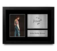 HWC Trading Millie Bobby Brown Strange Hawkins Thing Eleven Los Regalos Imprimieron La Imagen Firmada Del Autógrafo Para Los Fans De La Demostración De Serie De Televisión - A4 Enmarcado