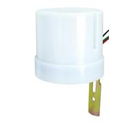 Interruptor fotoeléctrico 15A con detección de luz, ajuste de sensibilidad y protección IP44, ideal para controlar luces automáticas.