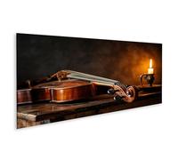 islandburner Imagen sobre lienzo Violín elegante en mesa de madera antigua con luz de velas - Panorama