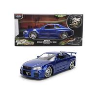 Jada Toys Fast & Furious - Coche fundido a presión a escala 1:24, edición aniversario Nissan Skyline GT-R (BNR34) 1999, acabado de metal cepillado azul con capó, puertas y cajuela de apertura,