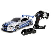 Jada Toys Fast & Furious RC Nissan Skyline GTR R34 - Coche teledirigido con mando a distancia, función de derrape, tracción total, 4 ruedas de repuesto, función de carga USB, escala 1:10, color azul y plateado